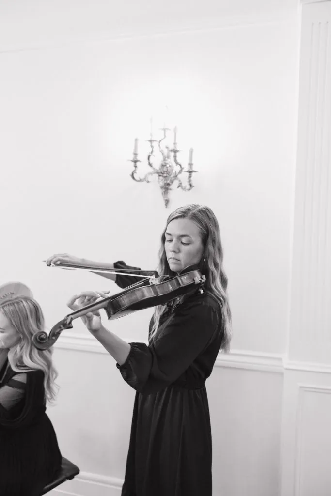 Eliza playing violin