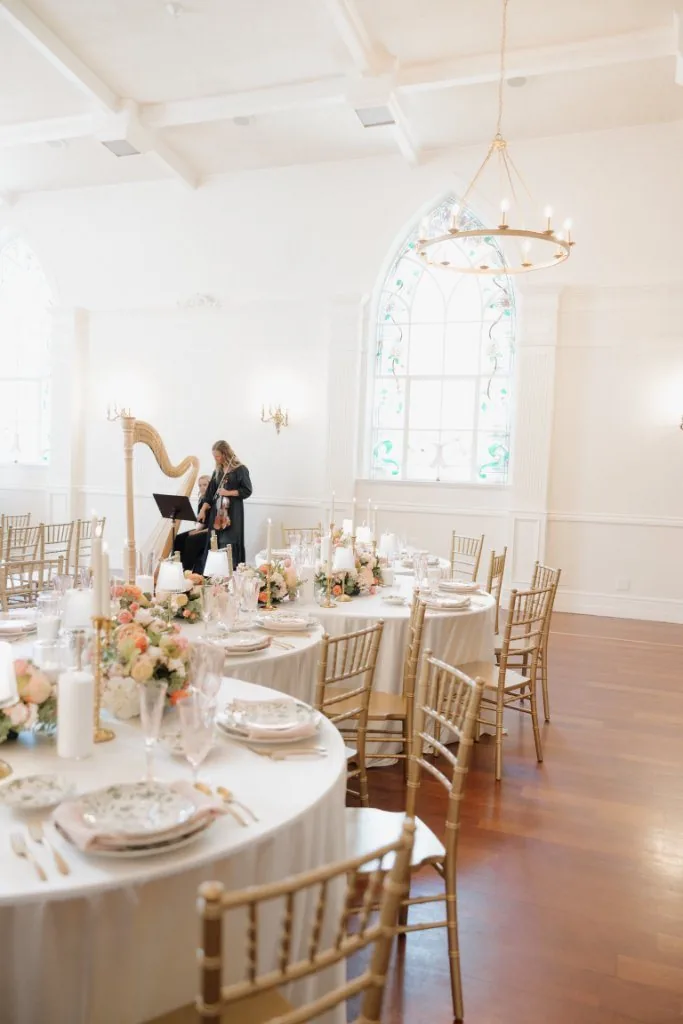 Elegant wedding reception with florals and candlelight